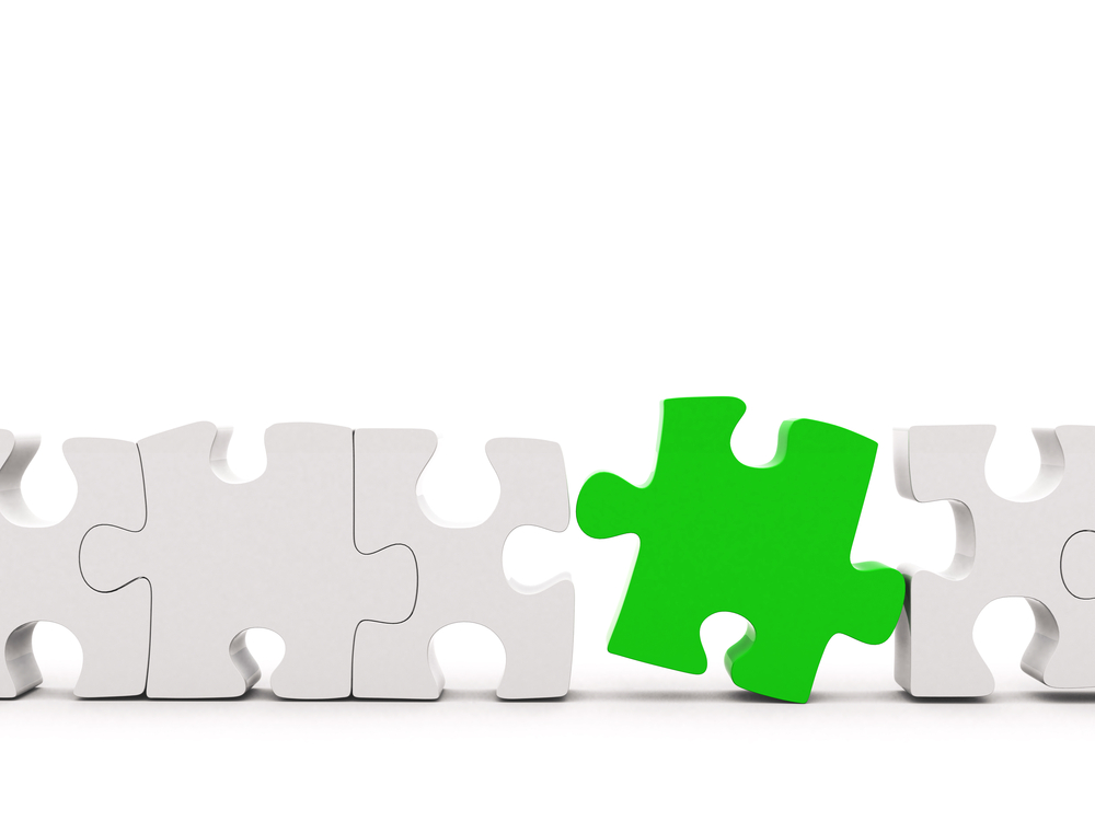 Outstanding green piece in a line puzzle isolated over a white background